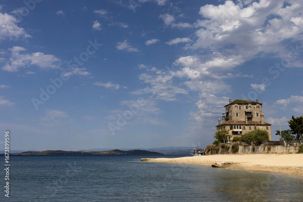 Fototapeta Byzantine Coastal Tower Overlooking the Aegean Sea in Ouranoupolis, Greece