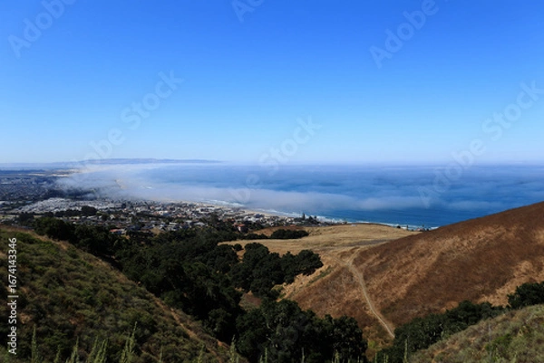 Fototapeta View of the bay from a hilltop against a bright blue sky.  California. 2024