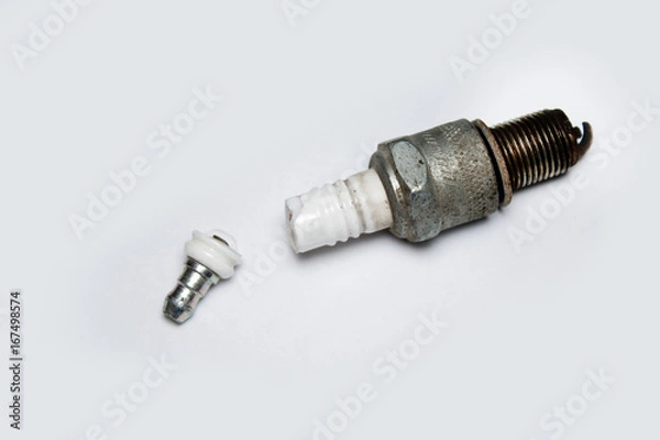 Fototapeta broken spark plug on white background
