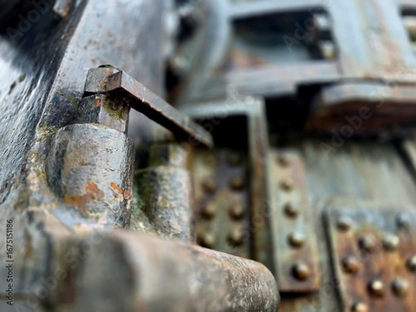Obraz Large size bolts and nuts in iron and steel factories, old vintage rusty metal door