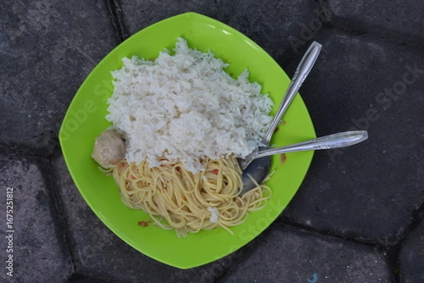 Fototapeta Plate of White Rice and Noodles with Meatball on Green Plate