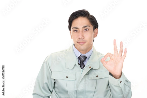 Obraz 作業着を着た男性