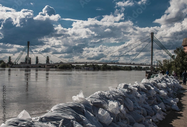 Obraz Men Against River