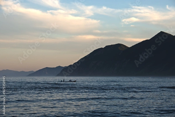 Obraz Fishermen return from ocean in evening