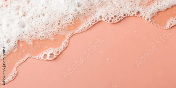 Fototapeta Foam bubble soap pastel peach background clean texture hygiene