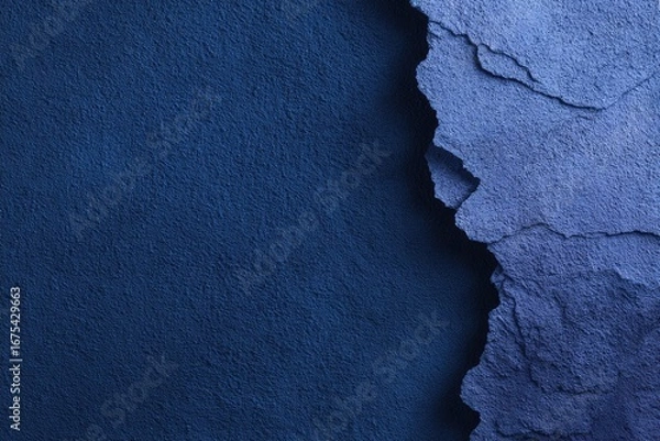 Obraz Deep blue textured surface with layered, torn edges