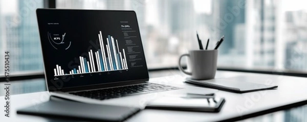 Fototapeta Laptop Displaying Business Data on Desk, finance , analytics