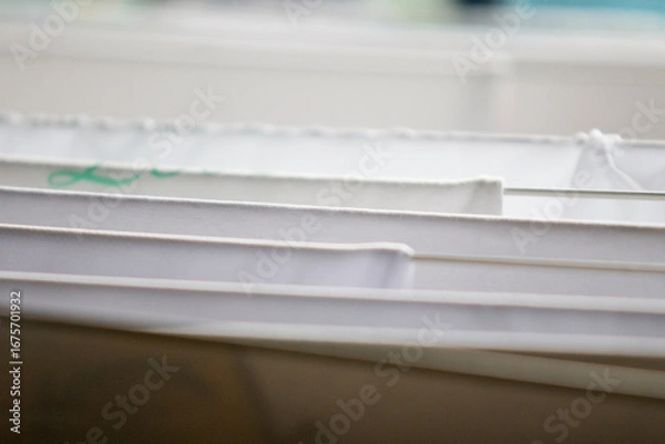 Obraz Washed white clothes on a hanger.