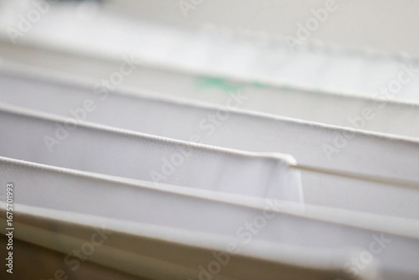 Obraz Washed white clothes on a hanger.