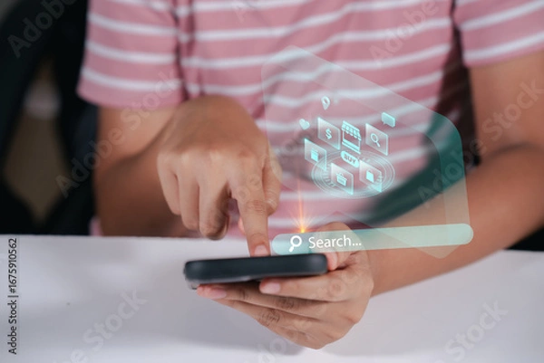 Fototapeta Woman using mobile smartphone with E-commerce technology icon on virtual global internet network, online retail shopping digital app.