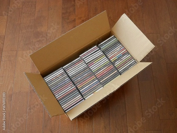 Fototapeta ダンボールに入れた大量のCD