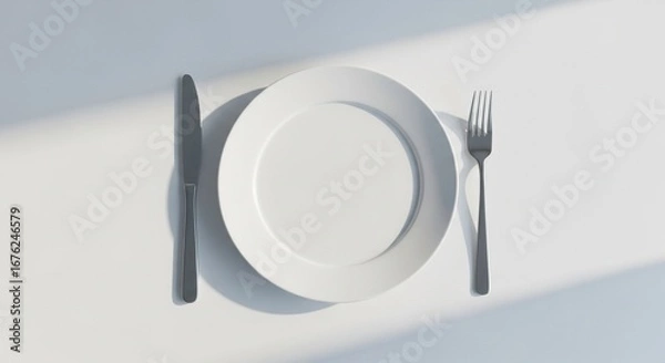 Fototapeta Plate with cutlery on the table