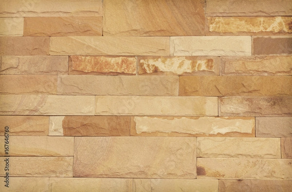 Fototapeta Background of modern stone brick wall texture, abstract sand wall or granite wall in natural patterns for design art work.