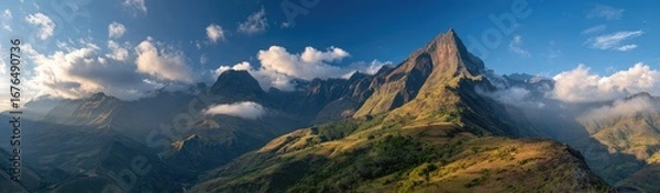 Fototapeta Panoramic mountain vista with dramatic clouds