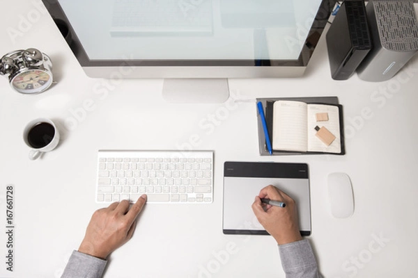 Obraz Man hand on computer keyboard on table top view