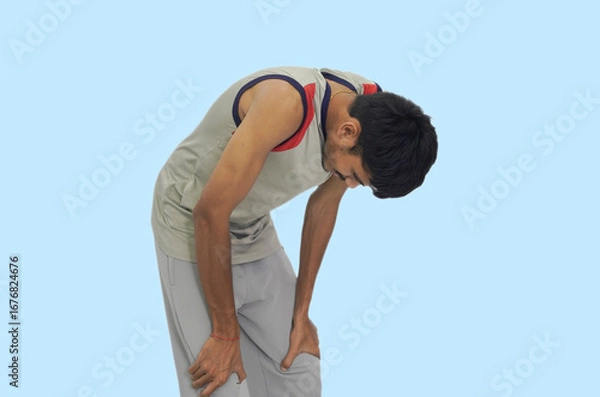 Fototapeta Exhausted Athlete Resting After Exercise, Fatigue Concept