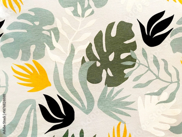 Obraz Tropical fabric pattern with abstract green monstera leaves, yellow and black accents on light background. Modern botanical textile design for fashion, home decor, summer style, and creative projects.