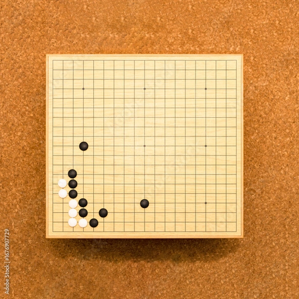 Fototapeta 囲碁 は 中国発祥 とされる ボードゲーム 【 囲碁 の 対局 の イメージ 】