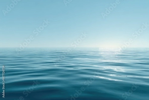 Fototapeta Calm, flat expanse of a tranquil blue sea meeting a pale blue sky