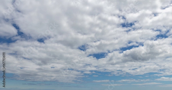 Obraz Sky replacement of blue sky and white clouds going into horizon 3