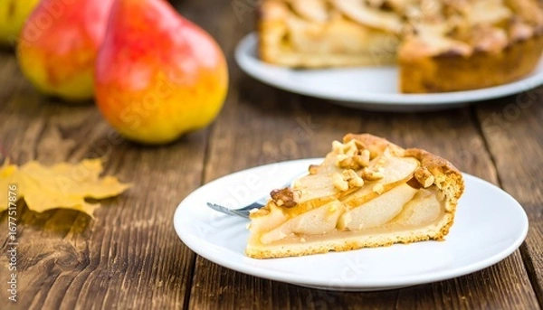 Obraz Pear walnut tart slice on a rustic wooden table