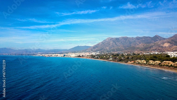 Fototapeta aerial view of the beach at the Mediterranean Sea near Marbella, view along the Costa del Sol in the summer, Andalusia, Spain