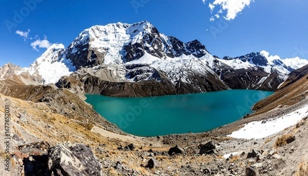 Obraz High-altitude lake nestled amongst snow-capped peaks