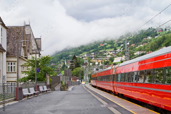 Fototapeta Train at the station in the Norwegian mountains