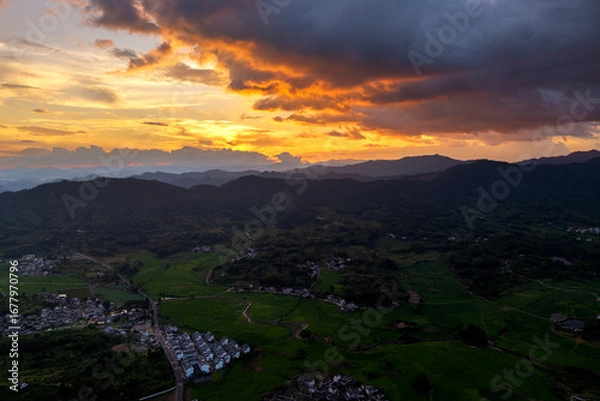 Fototapeta sunset over the mountains