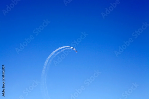 Fototapeta Acrobatic demonstration team of the Royal Jordanian Air Force, the Royal Jordanian Falcons, are flying over LIttle Petra, Jordan