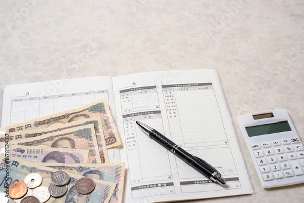 Fototapeta 家計簿、豊かで楽しい家庭生活を送るために必要な支出と収入を管理する
