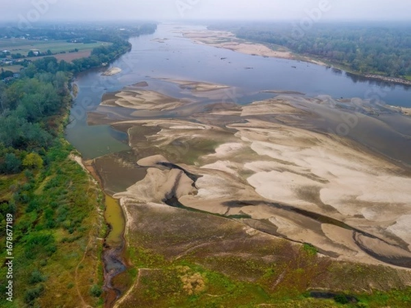 Obraz Dried riverbed of the Vistula during record summer drought, historic low water level of the Vistula river in Poland.
