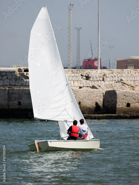 Fototapeta Small Sailboat with two persons