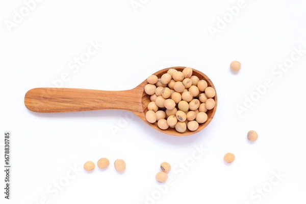 Obraz wooden spoon with beans, soy beans seeds in spoon 