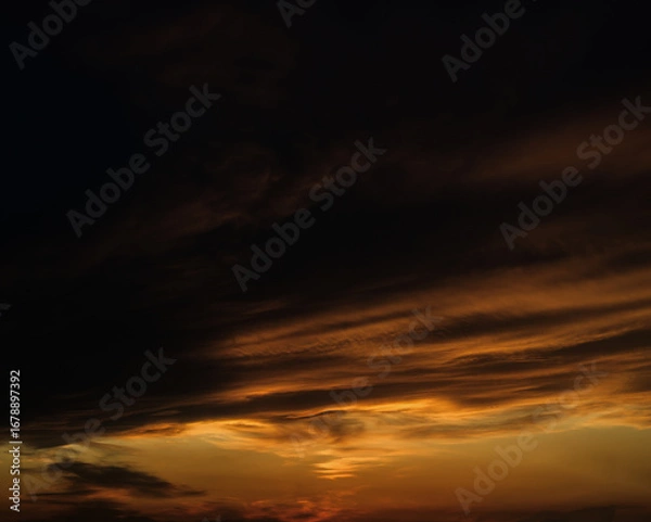 Obraz Sunset sky with orange clouds. Nature background.