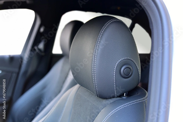 Fototapeta Headrest with adjustment button on a car seat