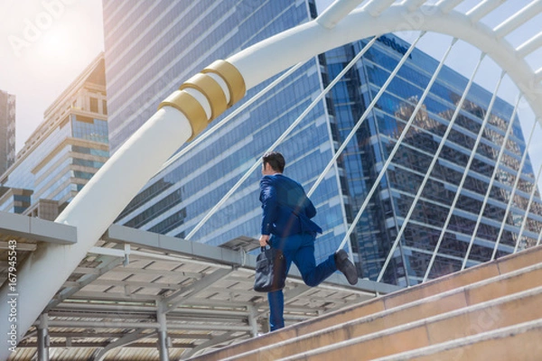 Fototapeta Business man run to work in rush hour