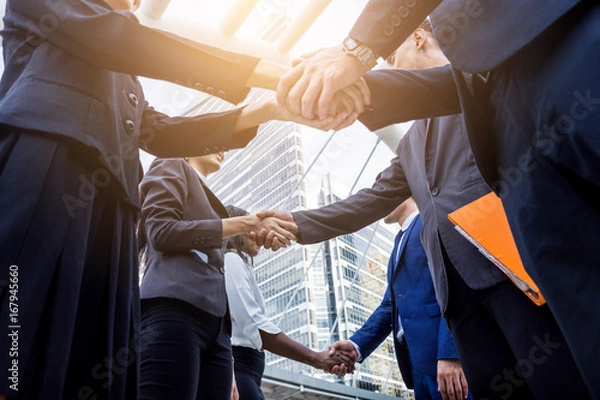 Obraz group of hand shake from business peoples after agreement