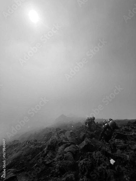 Obraz Climbimb through the misty mountain. 
Pico island, Azores