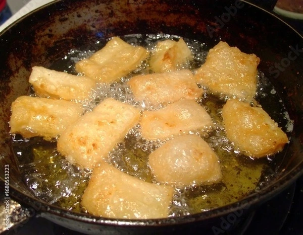 Obraz Crispy fried food in a pan