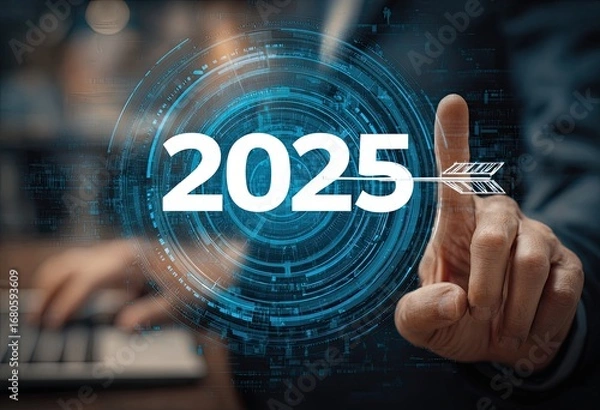 Fototapeta A hand points at a digital graphic of the year 2025, with a digital arrow targeting the date. Blurred background suggests a business setting