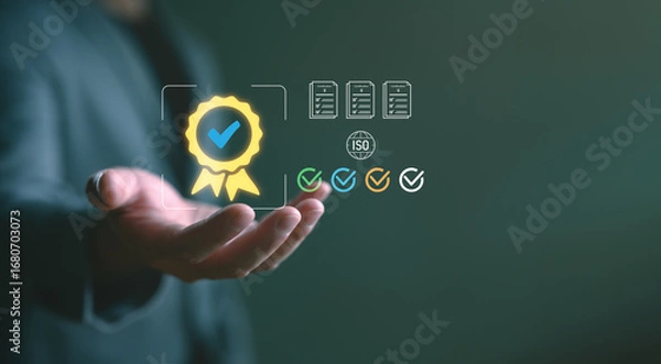 Fototapeta Businessman holding certification icon with checkmarks, ISO symbol, and documents. Represents quality assurance, standard compliance and professional business certification in modern industry.
