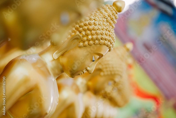 Obraz Beautiful golden Buddha statue enshrined in Thailand