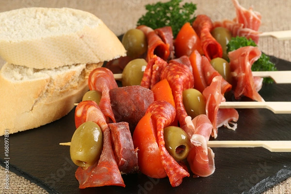 Fototapeta tapas meat olive and tomato