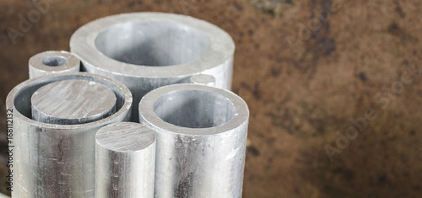 Obraz Metal pipelines profile on rusty background