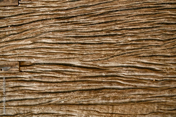 Fototapeta Texture antique oak furniture, with its rustic grain and retro design, showcases a natural wooden surface