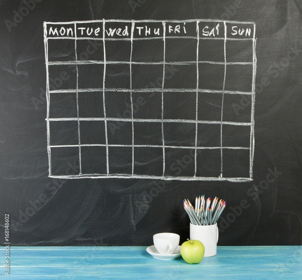 Fototapeta Grid timetable schedule on black chalkboard background.