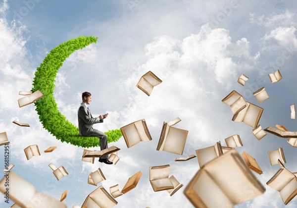 Fototapeta Man using smartphone and many books flying in air