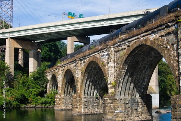 Fototapeta Train on the Railroad Bridge crossing the Schuylkill River in Philadelphia
