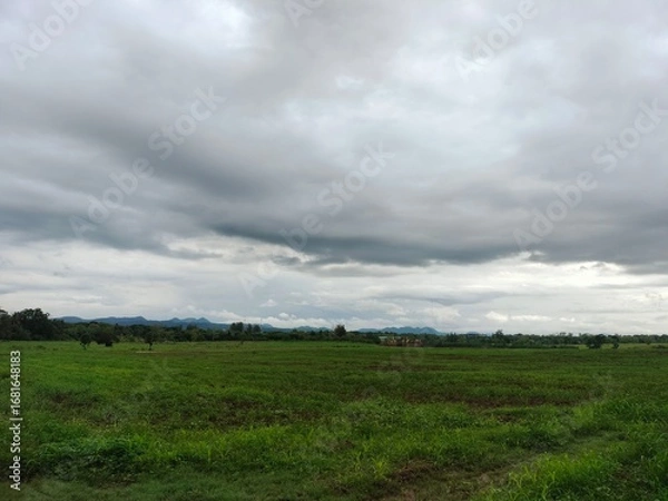 Fototapeta storm clouds over the mountain